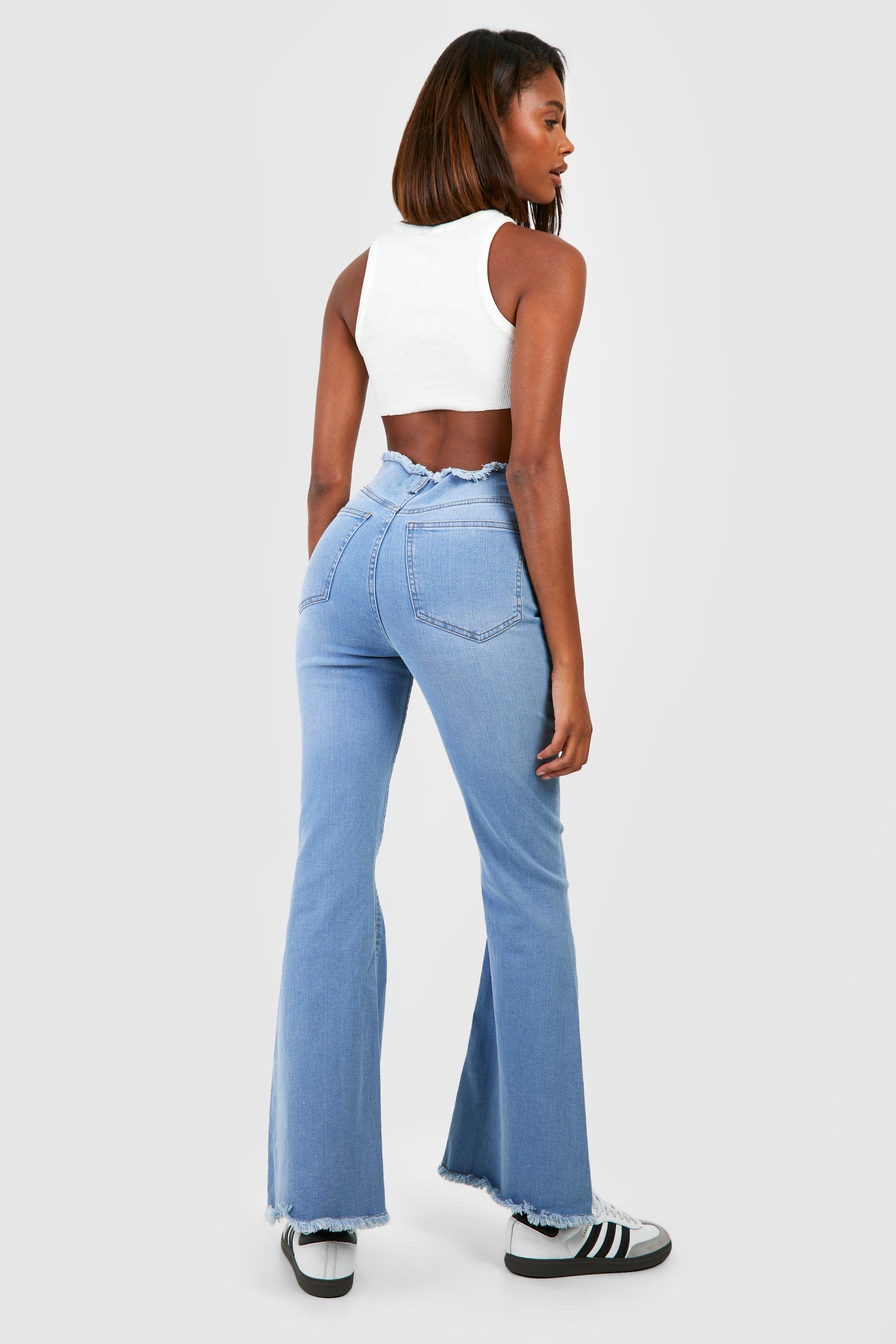 Basic High Rise Flared Jeans | boohoo